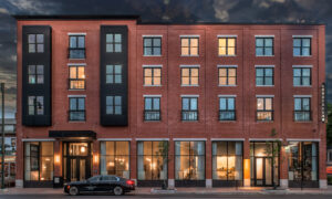 Exterior of Longfellow Hotel on a cloudy night; Photo Credit: Peter G. Morneau Photography