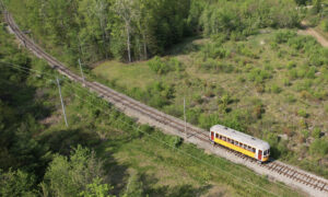Aerial of train through wilderness; Photo Credit: Jeff Terry