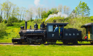 Maine Narrow Gauge train in the summer; Photo Credit: Bill Willis/Precious Escapes Photography