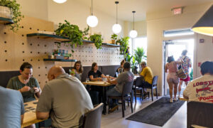 Customers enjoying games; Photo Credit: Amanda Huebner Photography