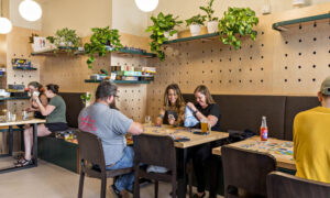 Customers enjoying games; Photo Credit: Amanda Huebner Photography