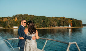 Wedding couple enjoying boat ride: Photo Credit: Kivalo