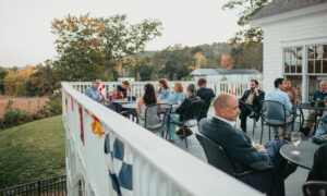 People sitting and eating during a wedding: Photo Credit: Kivalo