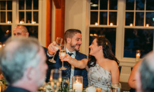 Wedding couple cheers-ing: Photo Credit: Kivalo