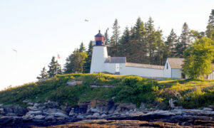 Lighthouse from the coastline; Photo Credit: Maine Maritime Museum
