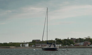 Sailboat sitting in Casco Bay; Photo Credit: Digital Edge