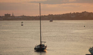 Sunset over Casco Bay sailboat; Photo Credit: Digital Edge