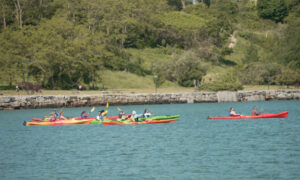 Group paddling through Casco Bay; Photo Credit: Digital Edge