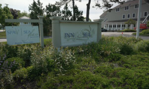 Inn by the Sea sign in the summer; Photo Credit: Digital Edge