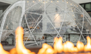 Alto igloo through firepit; Photo credit: Mitch Powers from Powerhouse Media