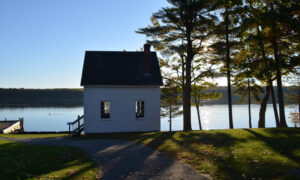 White house standing by the coast: Photo Credit: Maine Maritime Museum