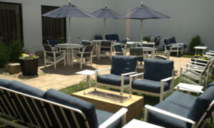 Hotel patio on a sunny day; Photo Credit: Digital Edge