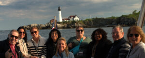 Group in front of Portland Head Light; Photo Credit: Digital Edge