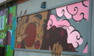 Painted mural on building; Photo Credit: Digital Edge