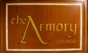 Wooden Armory Lounge sign; Photo Credit: Lauren Witt at Visit Portland