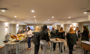 People socializing and networking; Photo Credit: Lauren Witt at Visit Portland