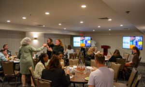 People socializing and networking; Photo Credit: Lauren Witt at Visit Portland