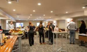 People socializing and networking; Photo Credit: Lauren Witt at Visit Portland