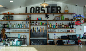 Luke's Lobster sign and bar; Photo Credit: Lauren Witt at Visit Portland
