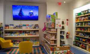 Wall of toys in a toy shop; Photo Credit: Lauren Witt at Visit Portland