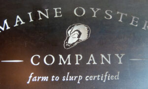 Maine Oyster Co. sign; Photo Credit: Lauren Witt at Visit Portland