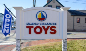 Island Treasure Toys open sign; Photo Credit: Lauren Witt at Visit Portland