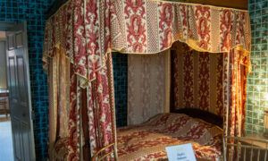 Vintage bedroom in Longfellow home; Photo Credit: Lauren Witt at Visit Portland