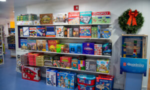 Wall of toys in a toy shop; Photo Credit: Lauren Witt at Visit Portland