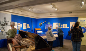 Group exploring music exhibit; Photo Credit: Lauren Witt at Visit Portland