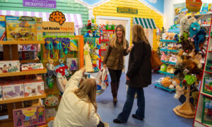 People shopping for kids toys; Photo Credit: Lauren Witt at Visit Portland