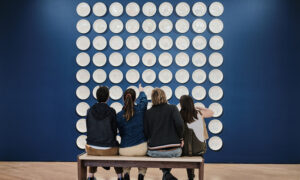 Group looking at art exhibit; Photo courtesy of the Farnsworth Art Museum