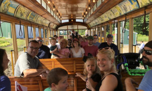 Family enjoying train ride; Photo Credit: Seashore Trolley Museum Collection