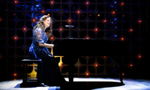 Woman playing piano on stage; Photos Credit: MSMT