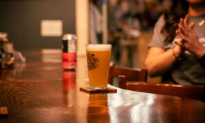 Drinks on bar at The Axe Pit; Photo Credit: Nate Davis