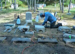 Jonathan Monro coring a tablet, Dodge family plot. Photo Credit: Bill Shumaker - Stewards of the Western Cemetery