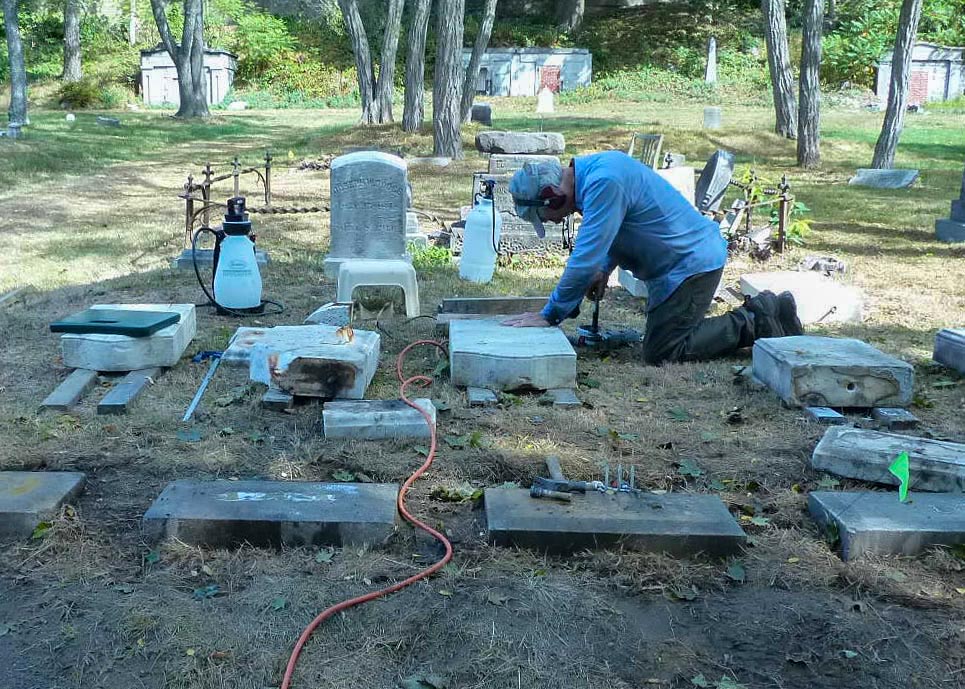 Jonathan Monro coring a tablet, Dodge family plot. Photo Credit: Bill Shumaker - Stewards of the Western Cemetery
