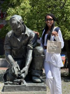 @mish_critiques in front of Lobsterman Statue, Photo Credit: Kirstie Archambault