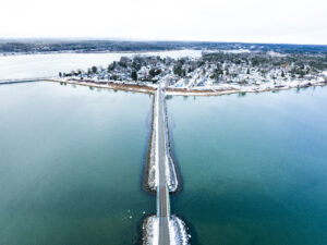 Aerial shot of snowy Portland and South Portland. Photo credit: Capshore