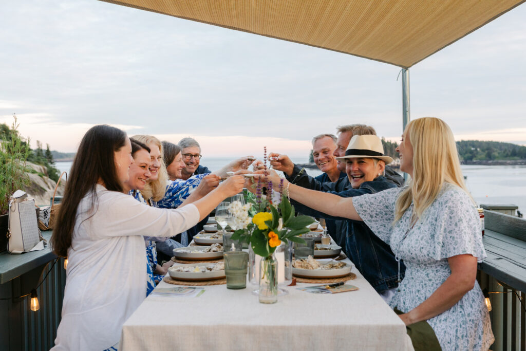 Group cheers. Photo Credit: Greta Tucker Photography