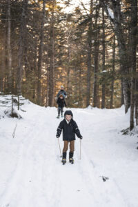 Snowshoeing in the Woods. Photo credit: Capshore