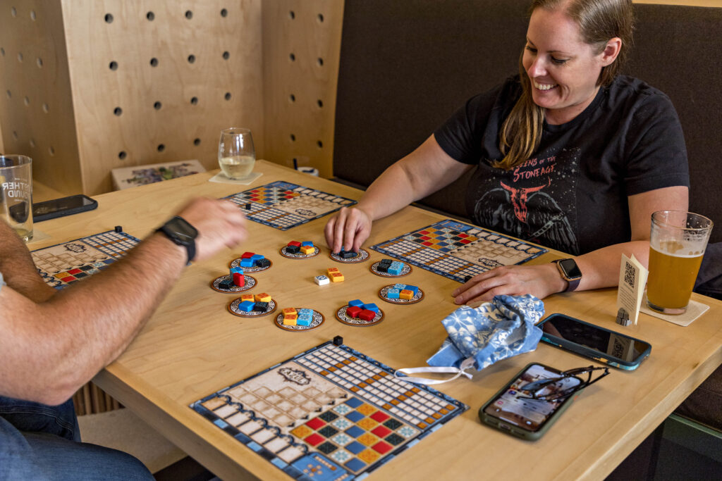 People Playing Board Games At Another Round. Photo credit: Amanda Huebner