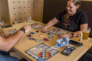 People Playing Board Games At Another Round. Photo credit: Amanda Huebner