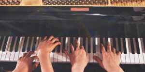 People Playing Piano. Photo provided by PCMF