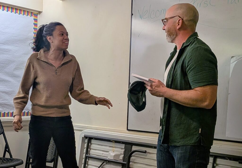 Two People Improvising. Photo Credit: Get Up & Go Improv