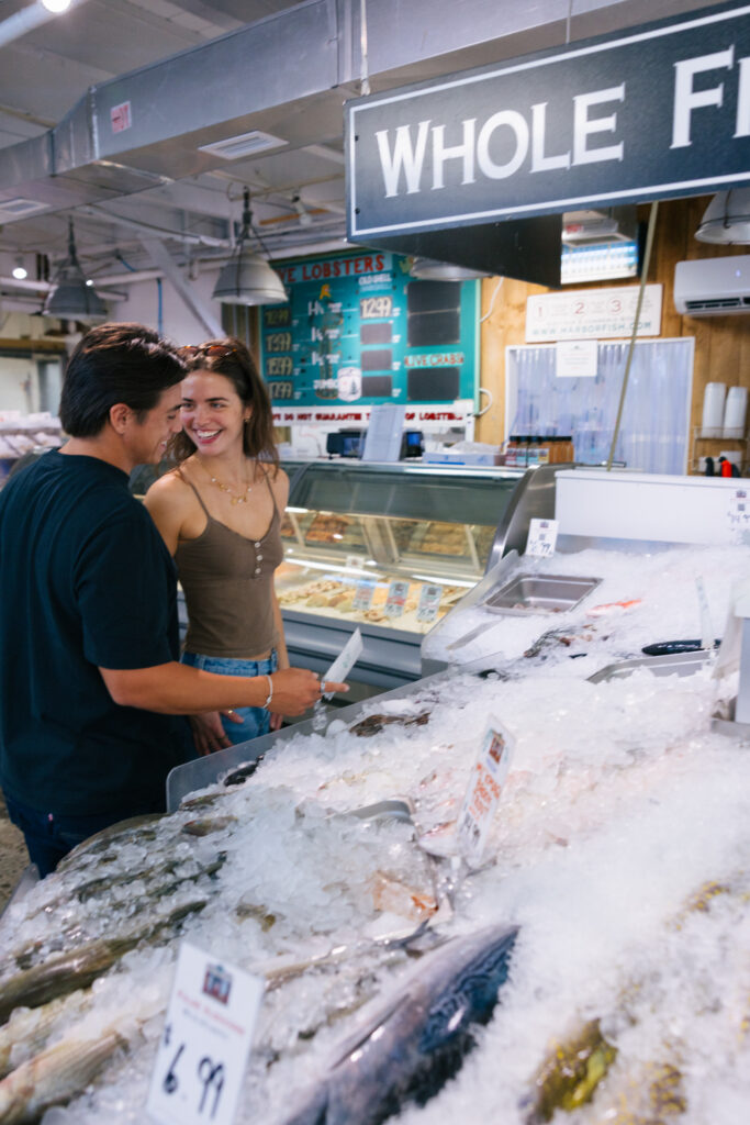 Couple Buying Fish at Harbor Fish Market. Photo credit: Andy Austin