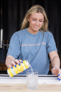 Bartender Pouring a Vodka Lemonade Après. Photo Credit: Capshore Photography.