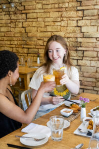 Cheers at Green Elephant Vegetarian Bistro. Photo Credit: Capshore Photography.