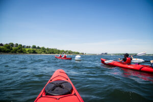 Sea Kayaking to East End Beach with Portland Paddle. Photo Credit: Capshore Photography.
