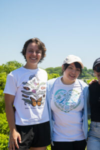 Friends Smiling in Liberty Graphics T-Shirts. Photo Credit: Capshore Photography.