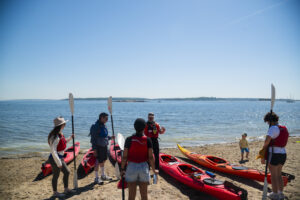 Taking off from East End Beach with Portland Paddle. Photo Credit: Capshore Photography.